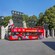 An open top double decker bus with the words ‘City Sightseeing Norway’ and “Hop On Hop Off’